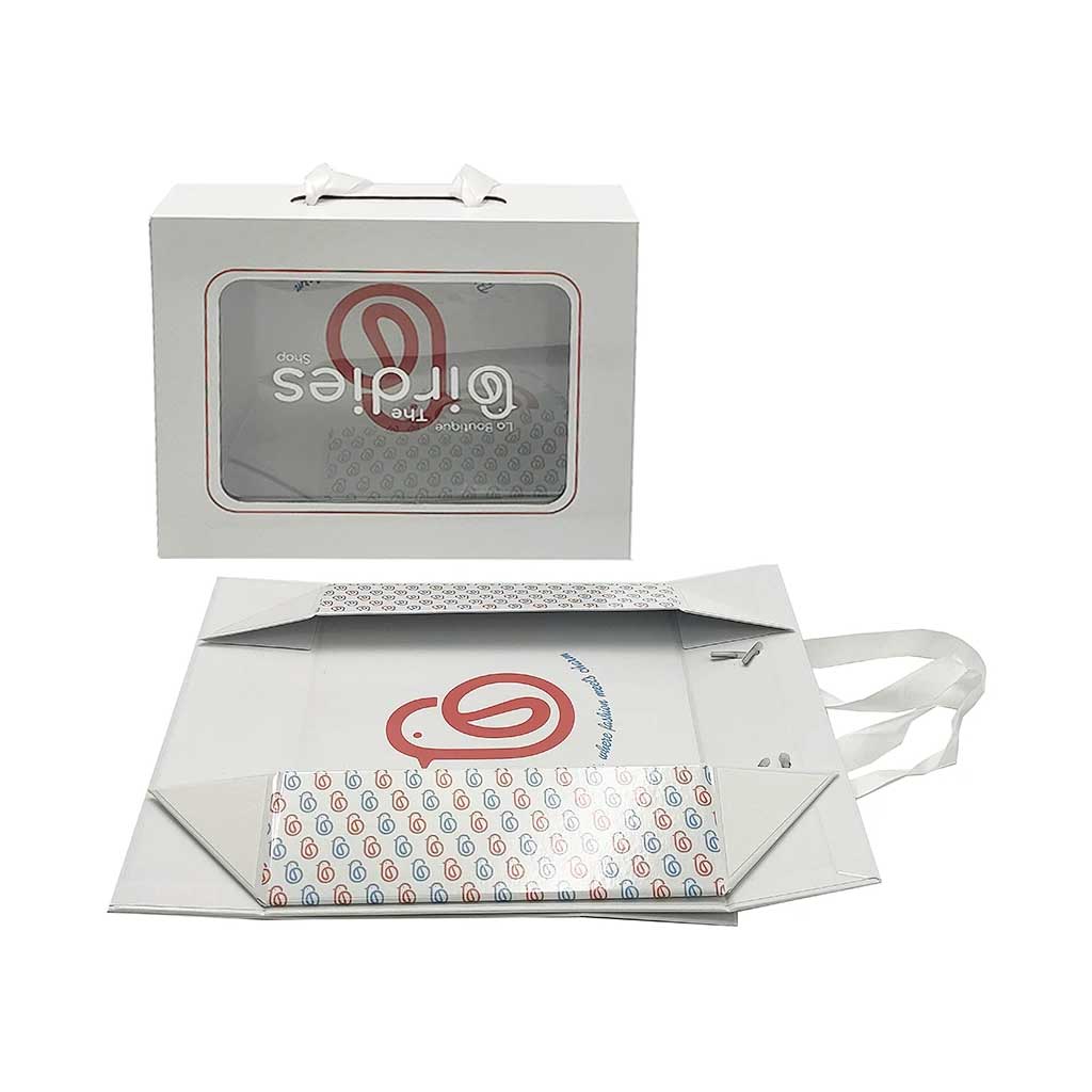 Magnetic box with die-cut handle for clothing retail
