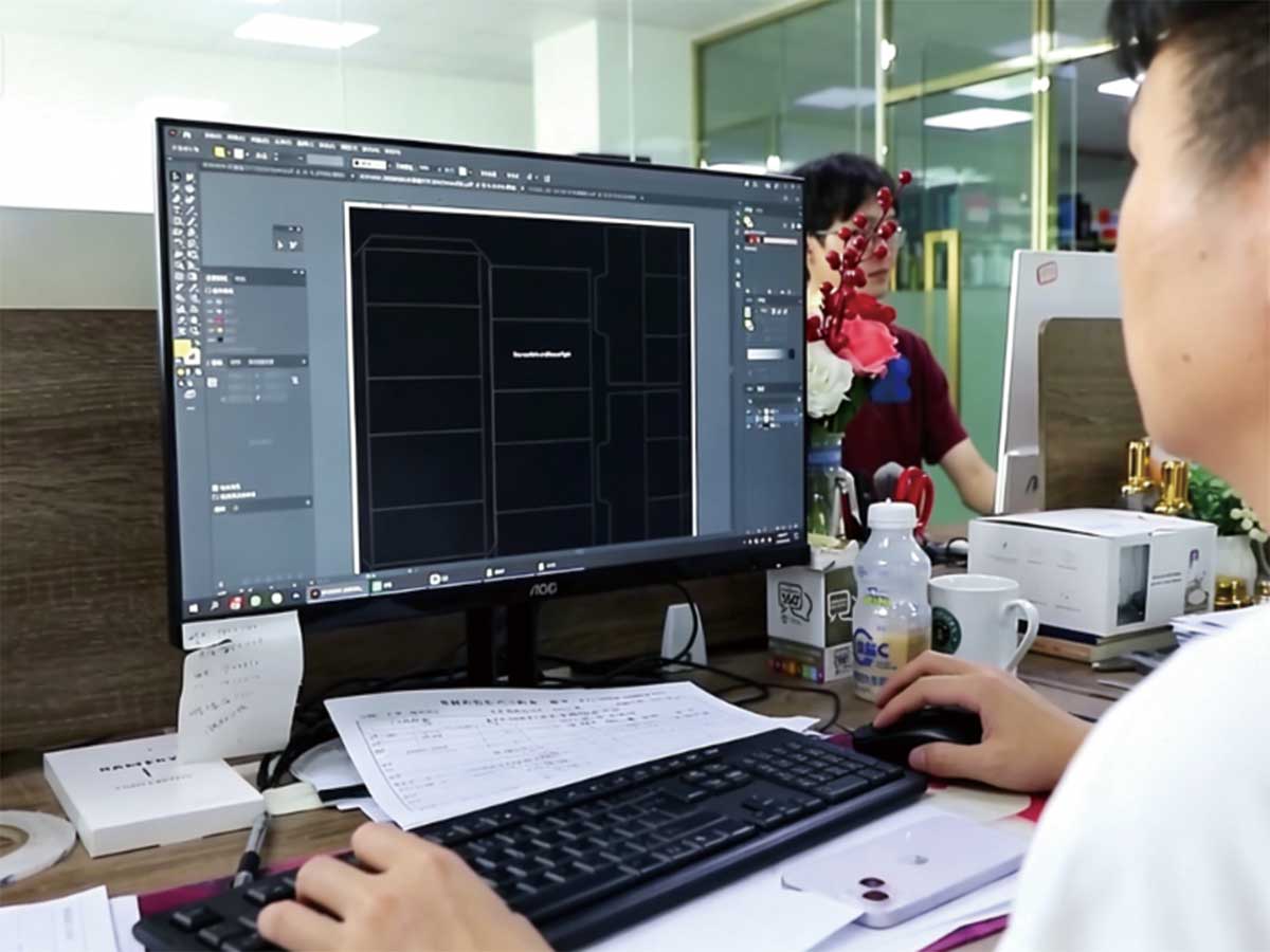 Engineering team designing custom packaging boxes structure and 3D mold drawings at Jinglin Packaging