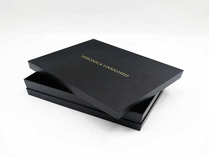 Black lid and base jewelry box with gold foil logo