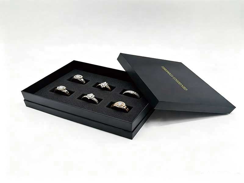 Black lid and base jewelry box with sponge insert for rings