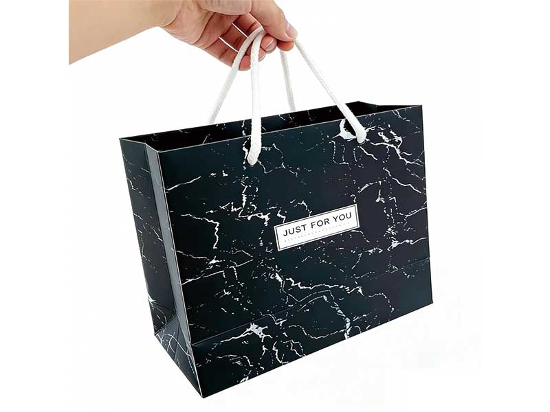 Flowers and luxury goods packaging with swag bag