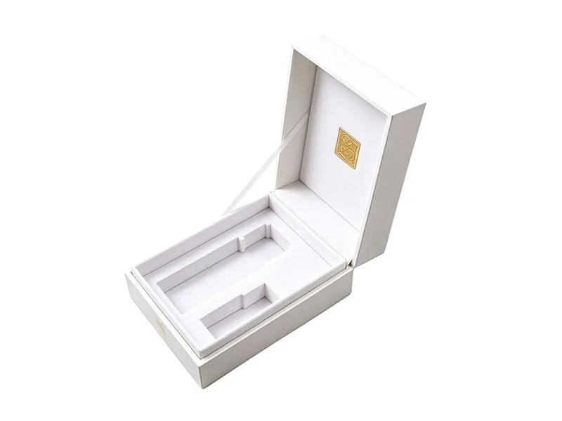 Detail of custom CNC die-cut flocked EVA foam insert for fragrance bottle and travel spray